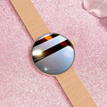 Smart watch for women with round colour screen and metal strap.