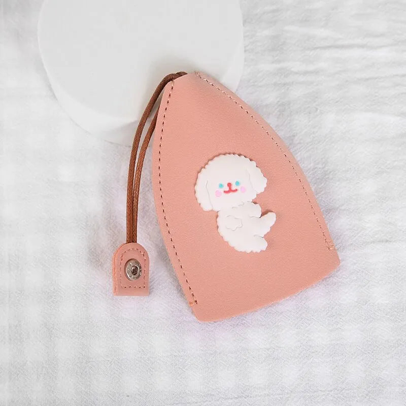 Colourful cartoon pull-out key protector case made from PU leather, showing a selection of fruit and animal designs.