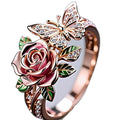 Adjustable butterfly personality ring with colourful oil drip finish showing rose and nature motifs