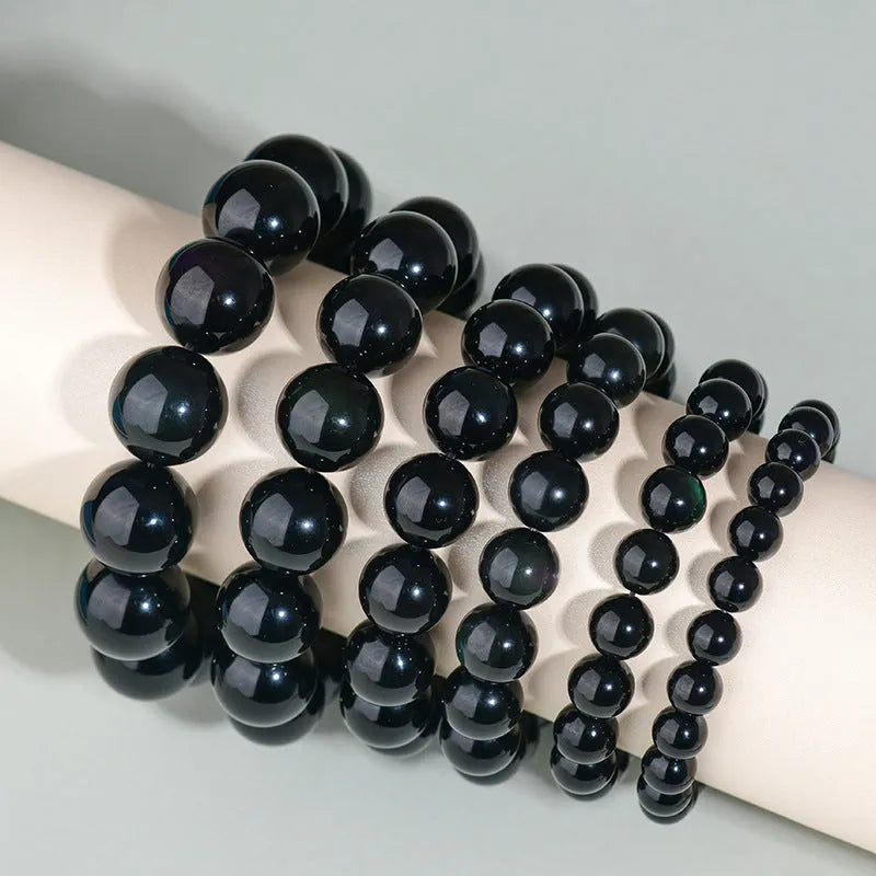 Hand-woven obsidian crystal bracelet with round beads in ethnic style unisex design