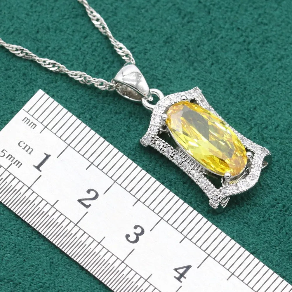 Zircon jewellery set with anti-allergy properties showing necklace, earrings, ring, and bracelet in olive green colour