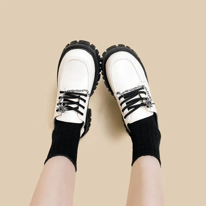 Women's preppy style loafers with metal cross shoulder straps in Duke Asterism colour