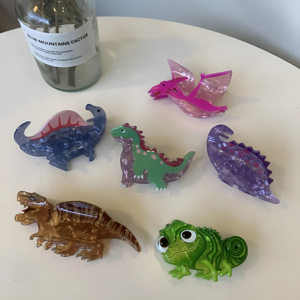 Acrylic dinosaur hair clip with jaw grip closure in one of six colourful designs