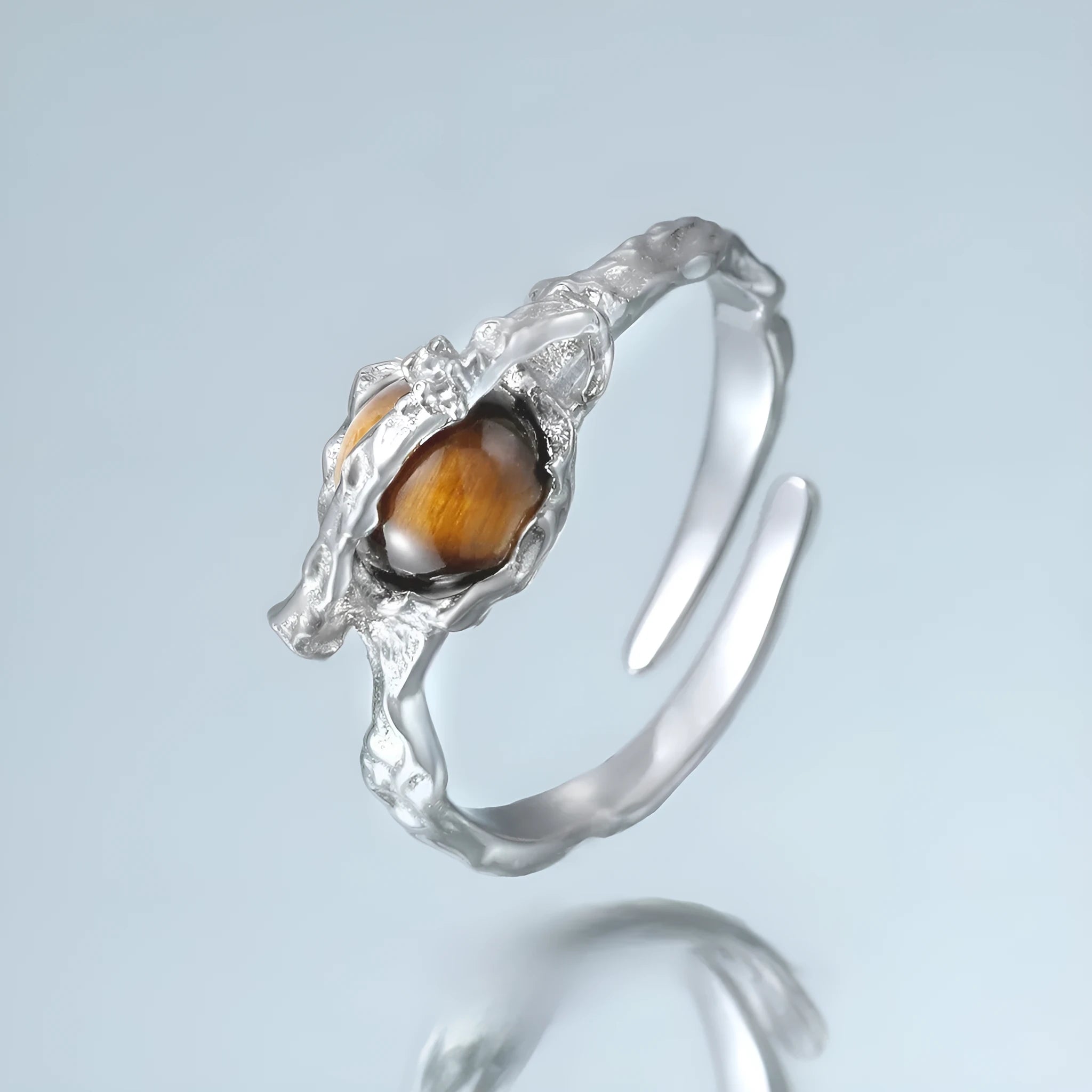 Women's silver Saturn design open ring with adjustable opening in white gold colour