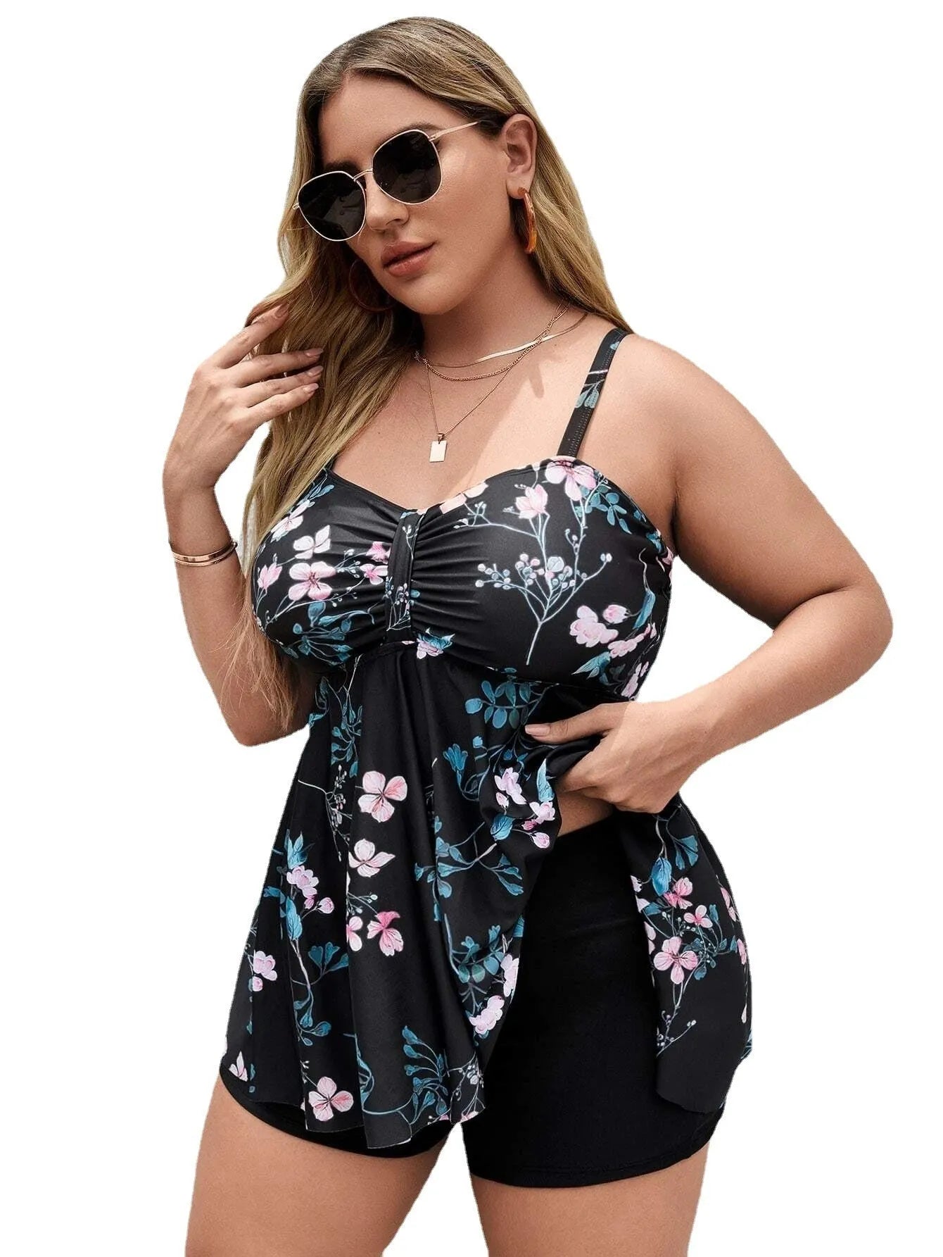 Women's floral print one-piece swimsuit with split colour design on mannequin