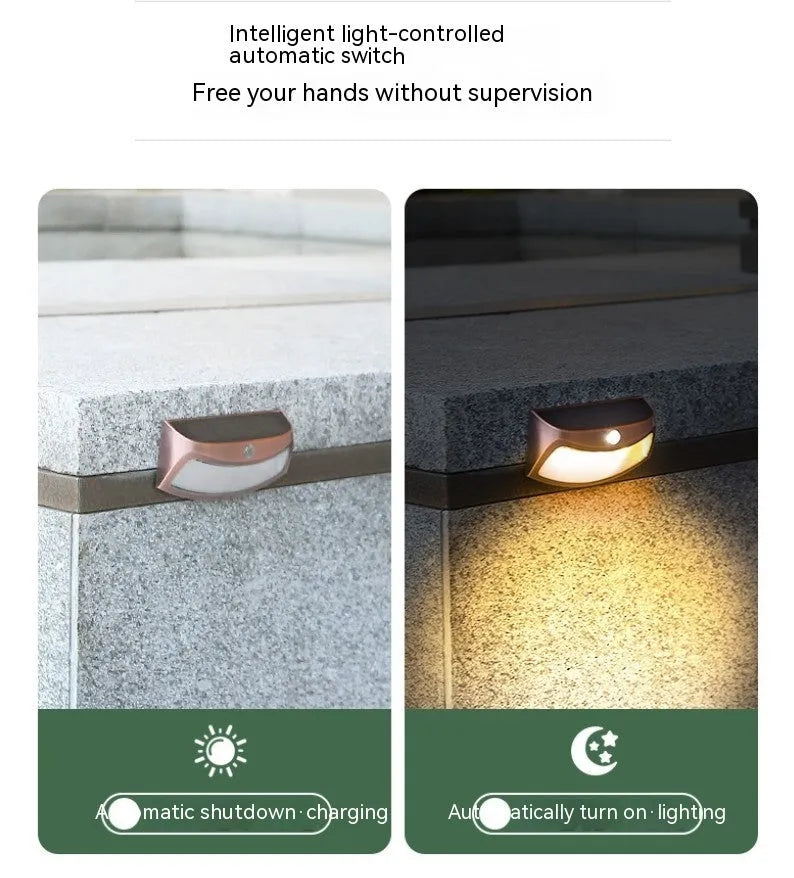Solar-powered outdoor wall lamp with smiling face design for garden courtyard lighting