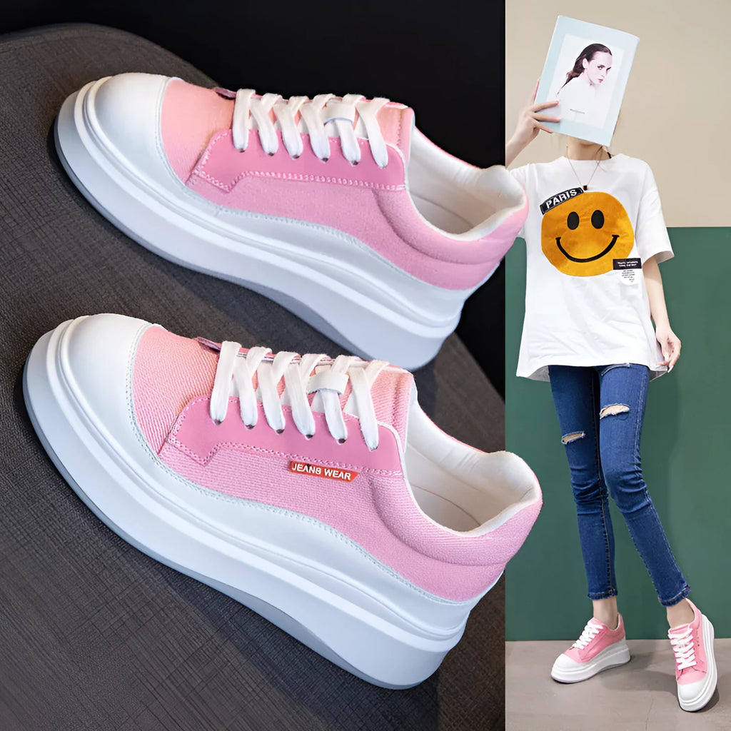 Women's beige and pink leather platform shoes with thick soles, shown from the side.