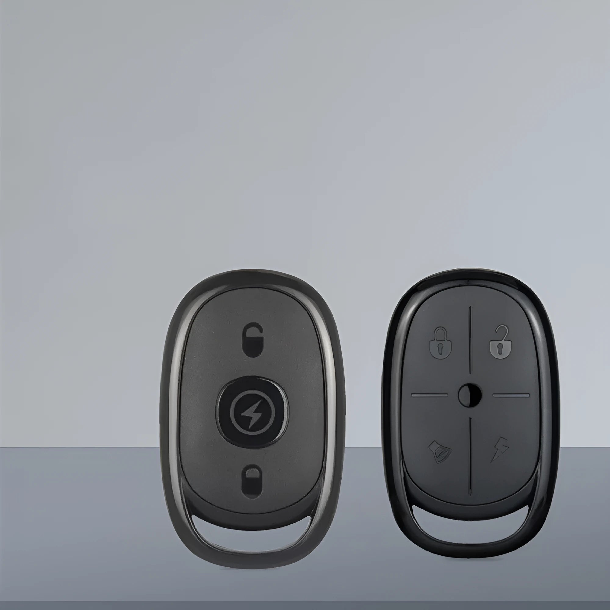 Compact black ABS plastic wireless remote control for electric cars with buttons.