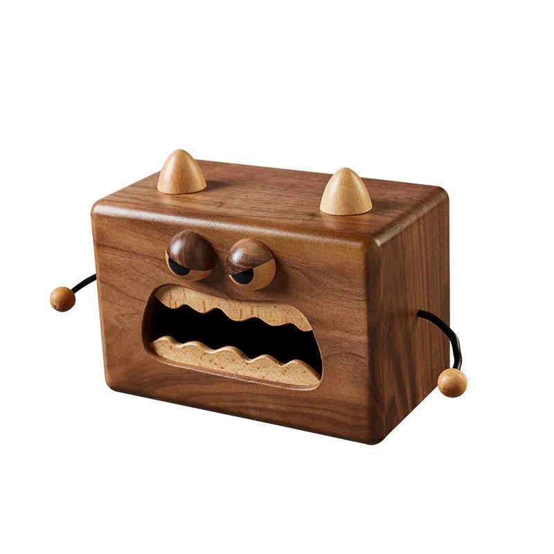 Wooden tissue box with cartoon monster design in walnut beech colour measuring 190x104x125mm