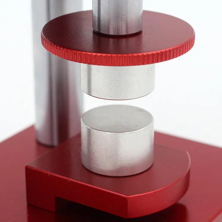 Watch repair spiral presser tool with a set of 20 plastic moulds for pressing on watch back covers.