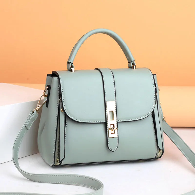 Women's soft PU leather messenger shoulder bag in square vertical design showing black, red, green and blue colour options