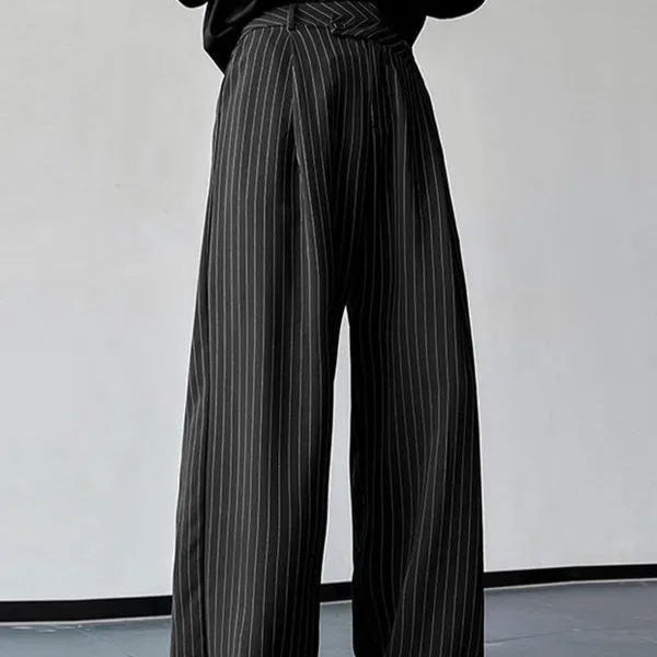 Black men's trousers with vertical stripes and front pleats on a high elasticity fabric.