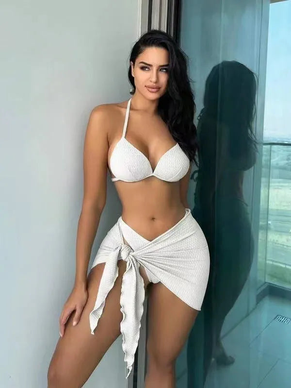Women's black three-piece swimsuit set with Russian split design, showing top, skirt, and panties.