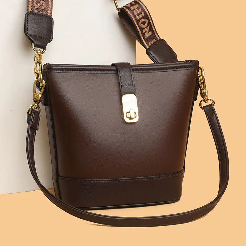 Korean-style black bucket shoulder bag with internal organisation compartments