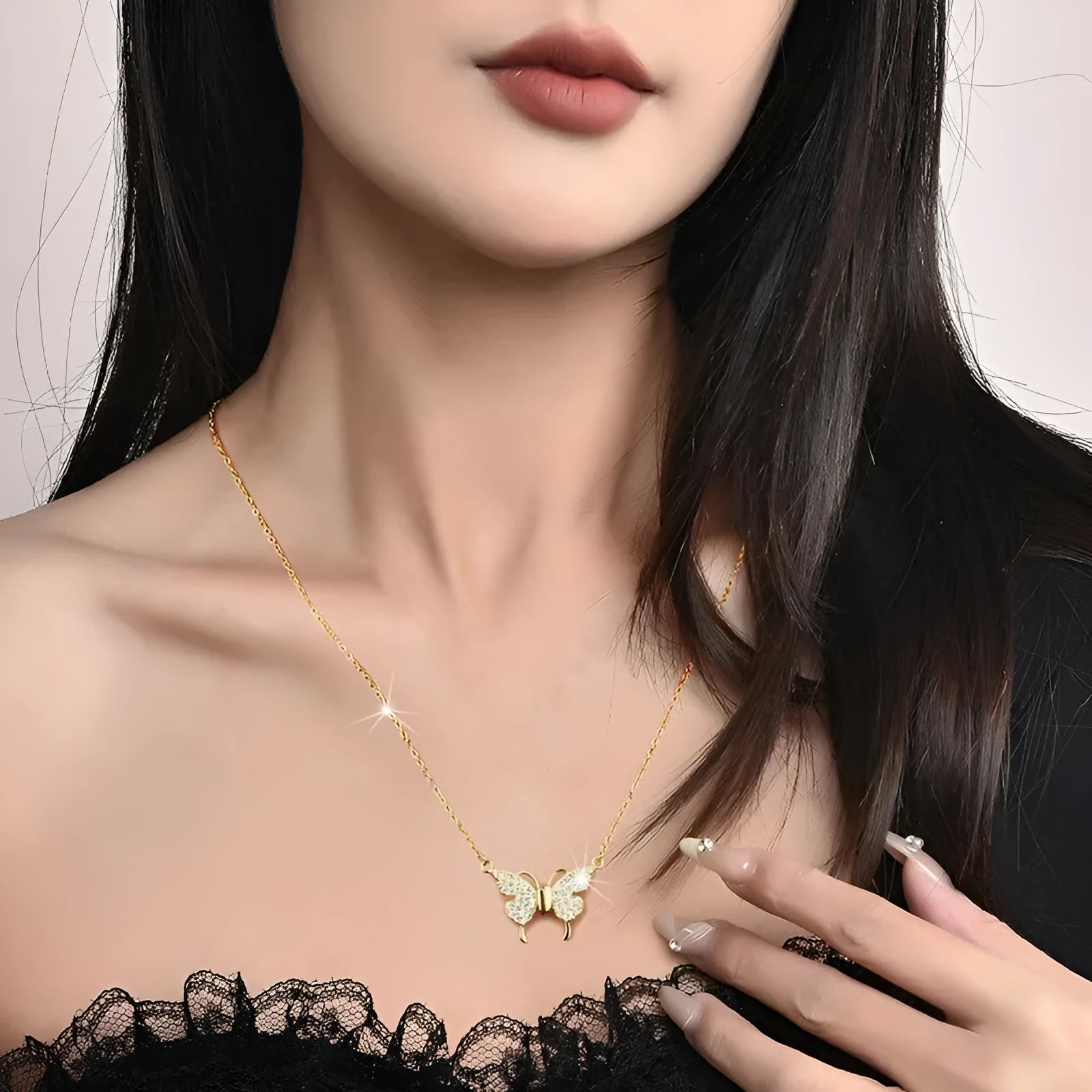 Women's gold tone butterfly necklace with twisted chain and magnetic clasp