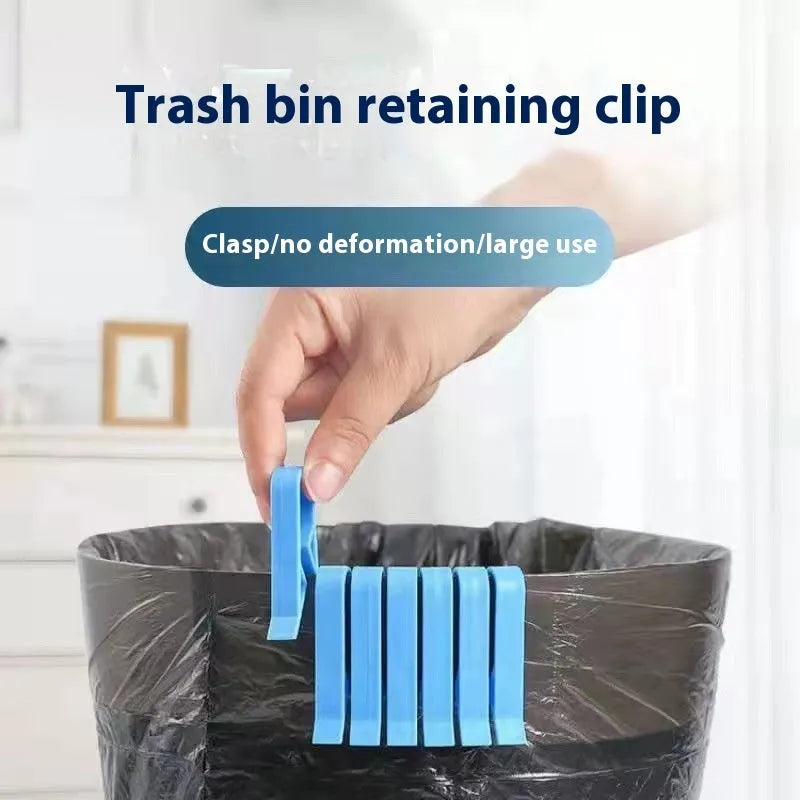 White PP plastic garbage bag fixing clip attached to the rim of a black indoor bin.