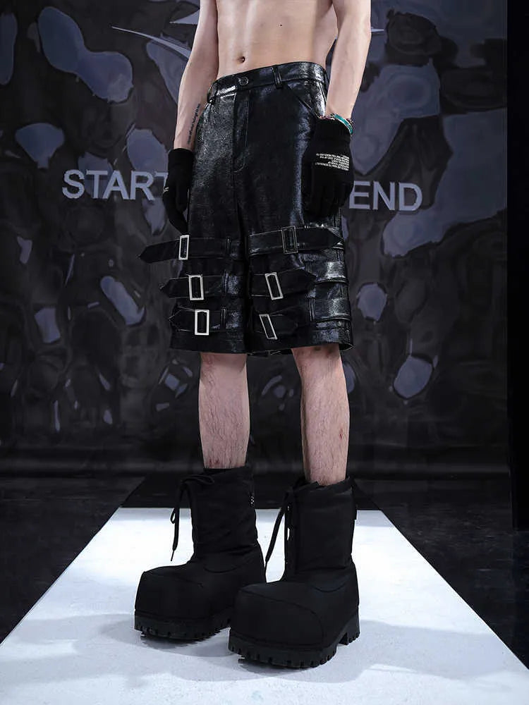 Men's black PU leather casual cropped shorts with an elasticated waistband.