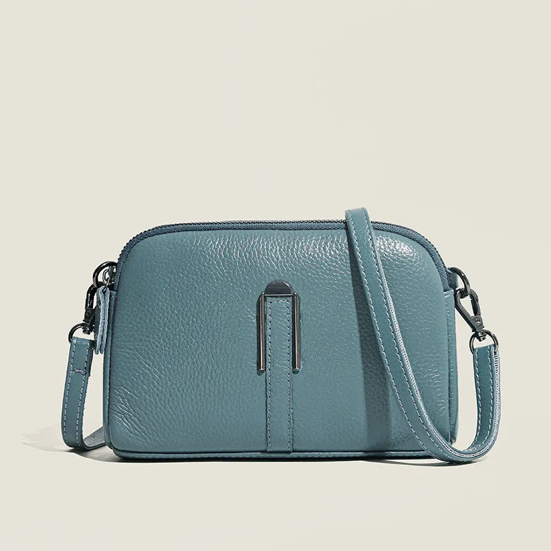 Genuine cowhide leather women's shoulder bag in horizontal square shape, 19x13x6cm, shown in a neutral colour.