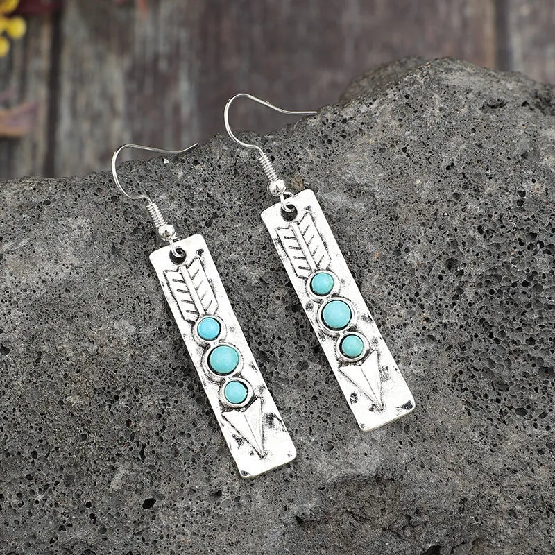 Silver geometric long strip earrings with turquoise inlay detailing and retro styling