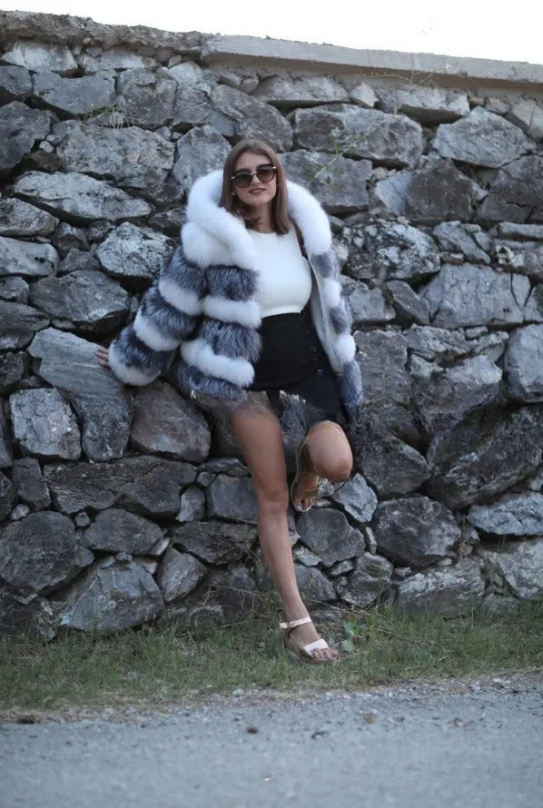 Women's loose faux fur hooded coat in street fashion style with 65cm length