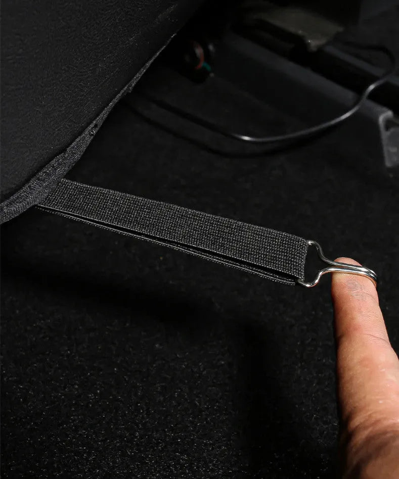 Black leather anti-kick pad for car rear seat protection, showing single pocket.
