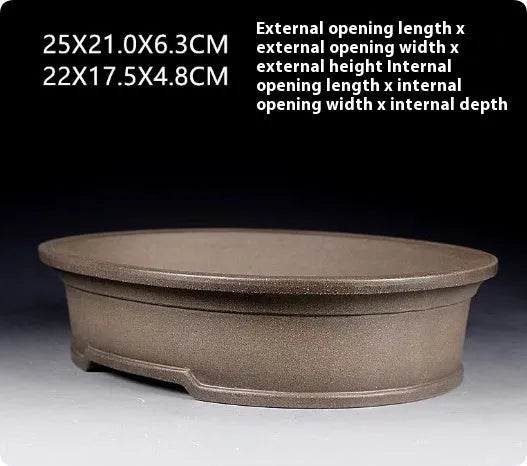 Handmade antique oval bonsai pot in purple sand clay measuring 25x21x6.3cm