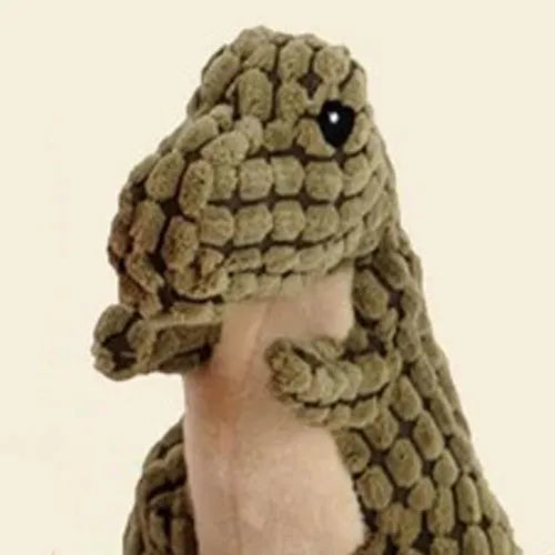 Set of four grey, green, and orange dog chew toys that produce sound, shown with size scale.