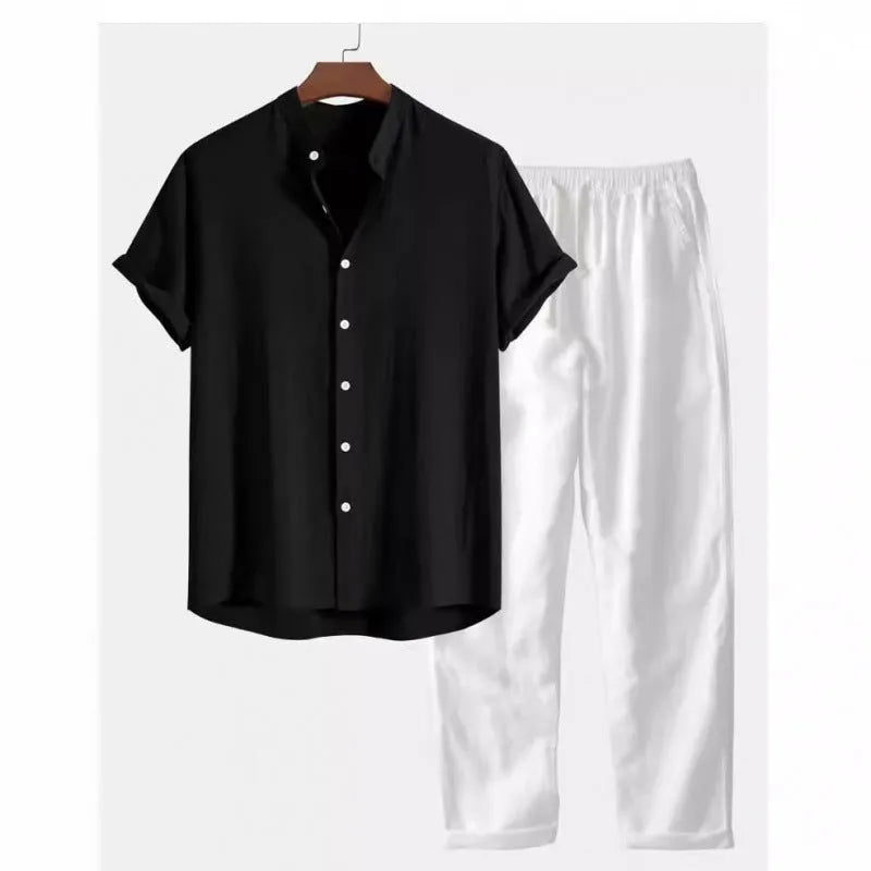 Man wearing a loose casual short-sleeve linen-look shirt and matching trousers in a solid colour.