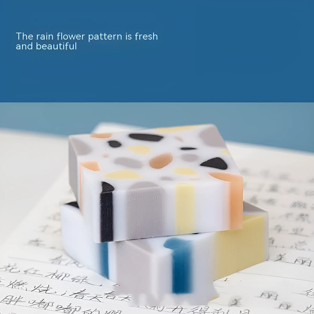 White brick-shaped rubber eraser for traceless pencil mark removal on paper