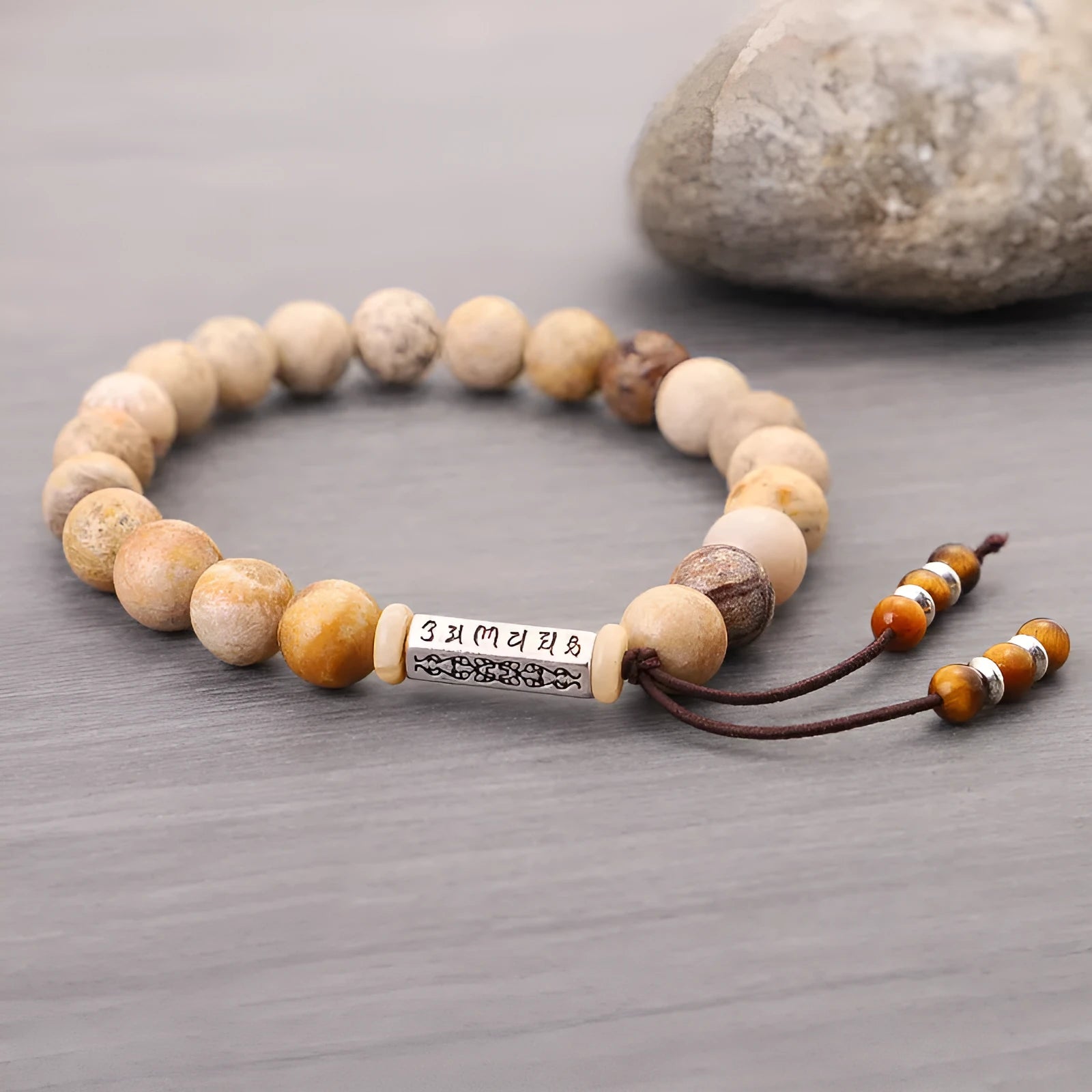 Handmade stone bead bracelet with wooden colour accents in retro minimalist design