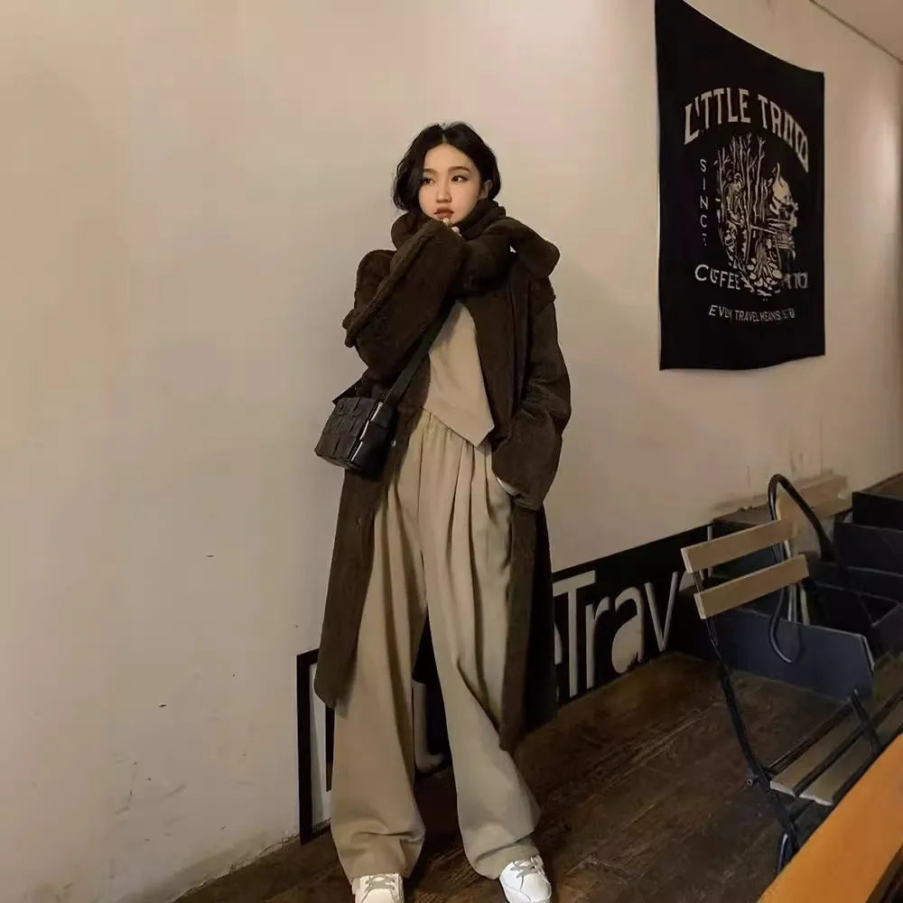 Brown women's loose fit casual sports suit set with long sleeve top and trousers.
