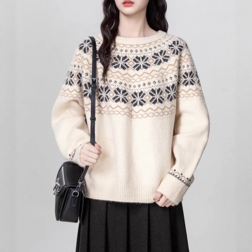 Milky white women's Fair Isle patterned knit sweater with loose fit and crew neck.