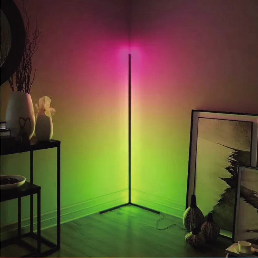 Black aluminium smart RGB floor lamp with silicone shade and remote control on wooden floor