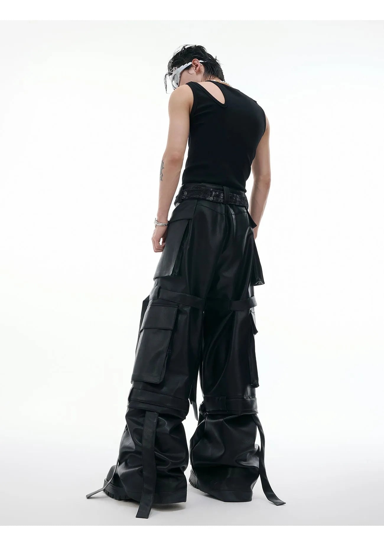 Men's black quilted loose fit trousers with ribbon stitching and multiple pockets