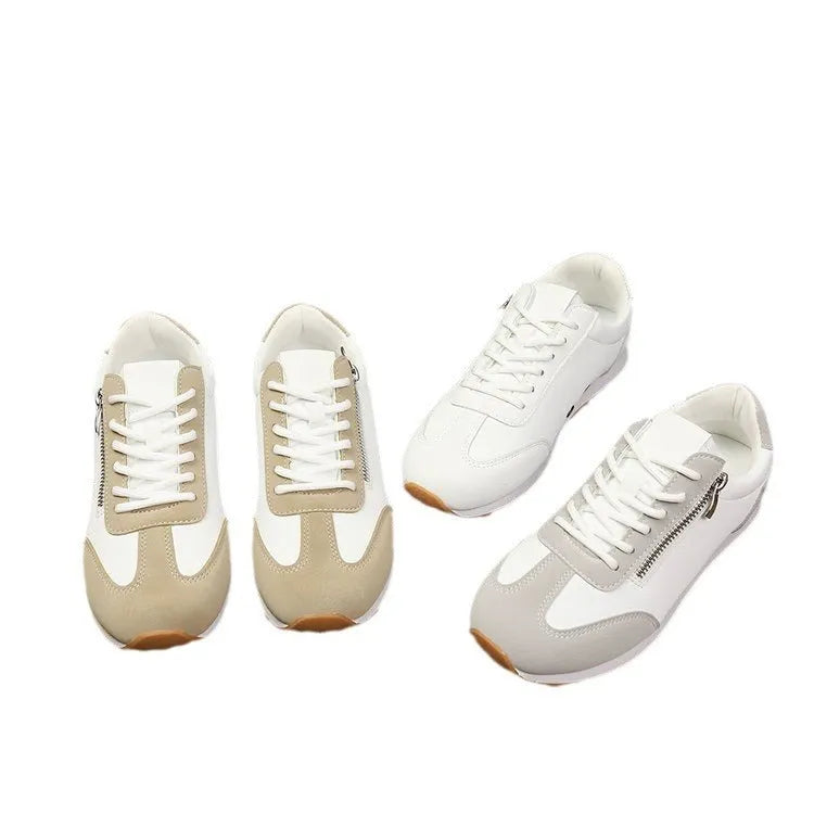 Women's flat shoes in champagne, grey or white with artificial PU upper and rubber sole.