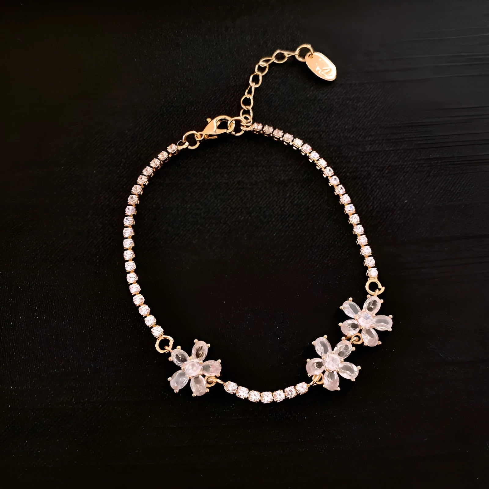 Women's gold colour copper bracelet with geometric zircon inlays and quadrilateral design