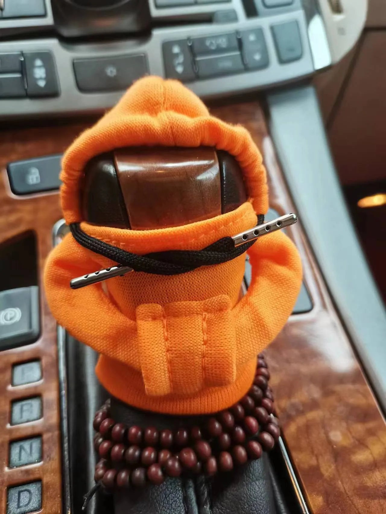 Dutch velvet car gear handle sleeve in multiple colour options on a car gear stick