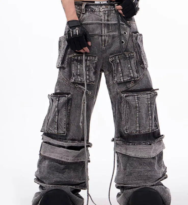 Grey American-style distressed denim overalls with rope stitching on cotton fabric.
