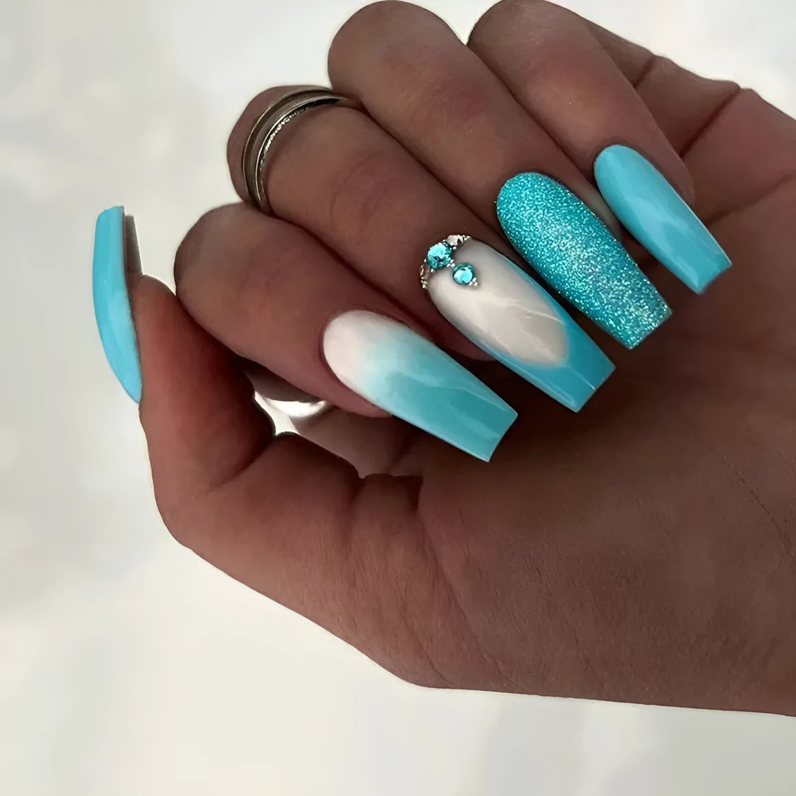 Solid blue long ballet shaped false nail patches with glue bottle