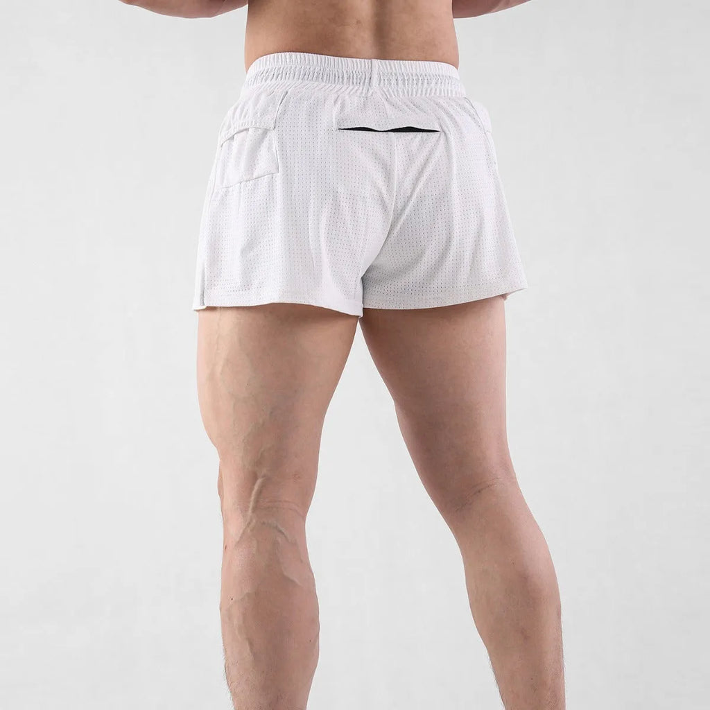 Men's black and white nylon shorts with a mid-waist design for summer sports.