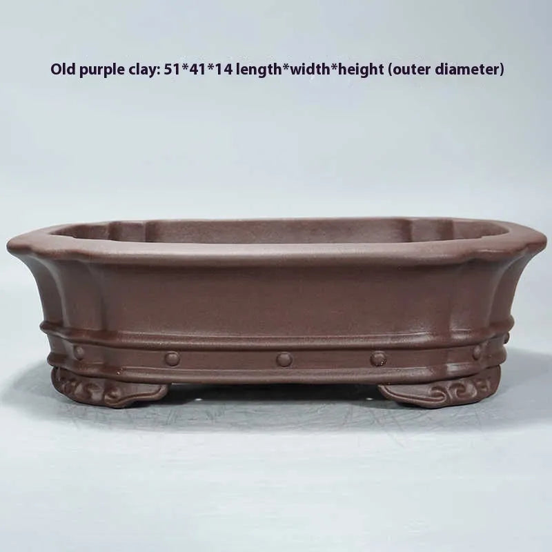 Purple sand handmade rectangular begonia flower pot measuring 51x41x14cm on desktop