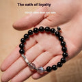 Obsidian Buddha beads couple bracelet set showing 10mm men's and 8mm women's Tibetan style bracelets