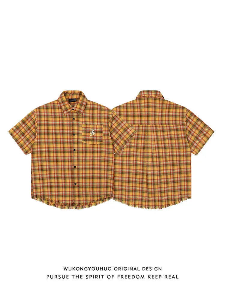 Yellow grid patterned plaid shirt with American embroidery pocket and short sleeves