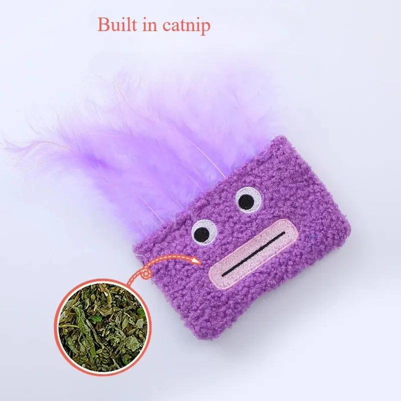 Blue plush cat toy shaped like a big mouth explosion head with catnip inside.