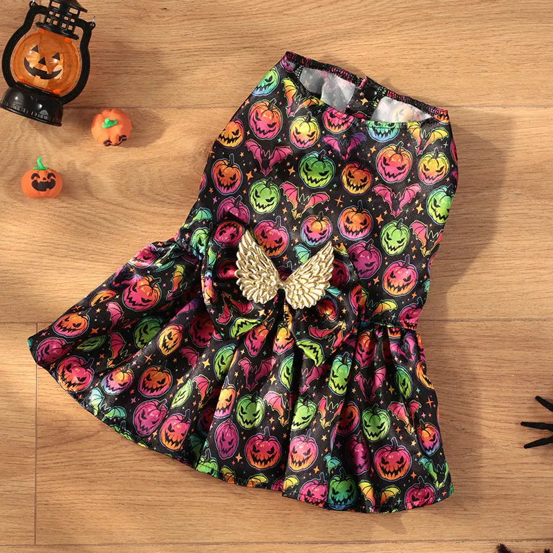 Angel wings Halloween dog costume in bright pumpkin orange and bat pattern colours