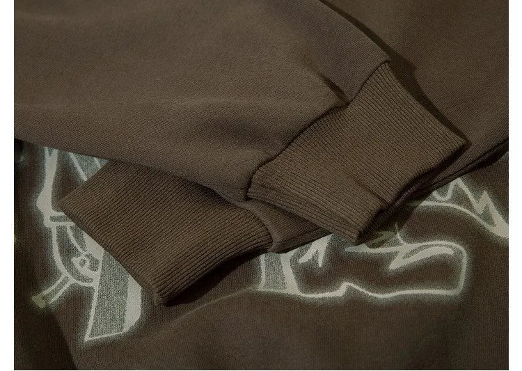 Loose-fitting couples oversize hoodie in brown, round neck, long sleeves, side view on plain background
