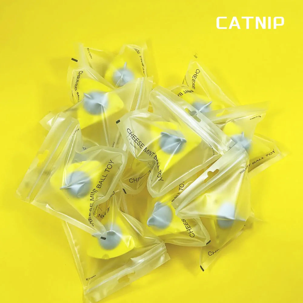 Yellow catnip toy balls for dental cleaning and feline entertainment
