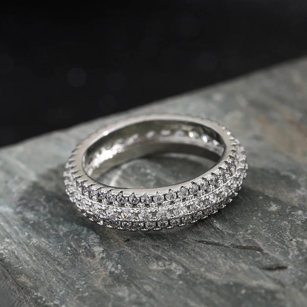 Geometric copper ring with triangular zircon stone inlay in white gold finish