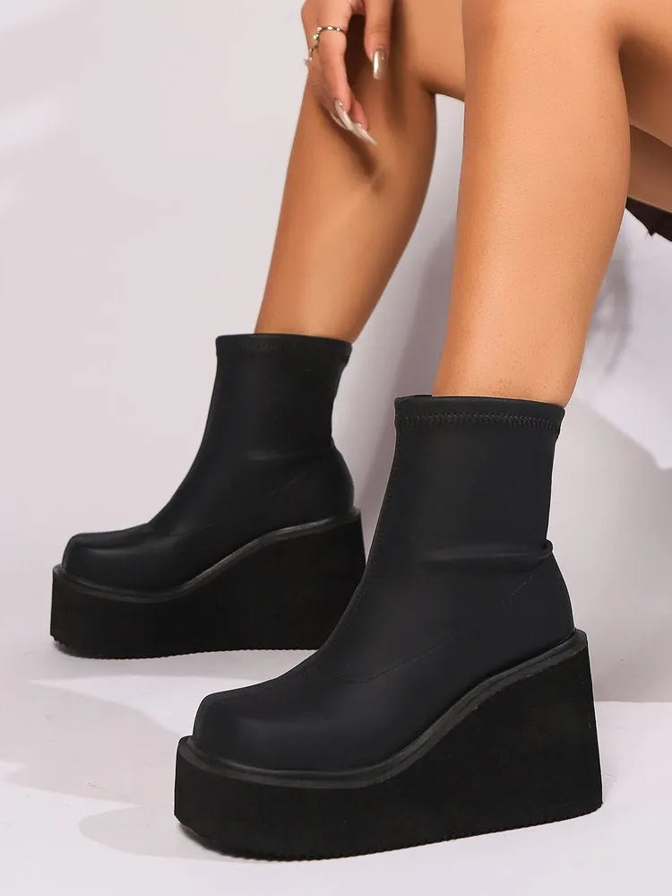 Black plus size women's wedge boots with 6-8CM heel, artificial PU upper and round toe design