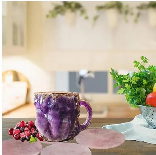 Purple and blue resin coffee mug with crystal texture and handle on wooden table